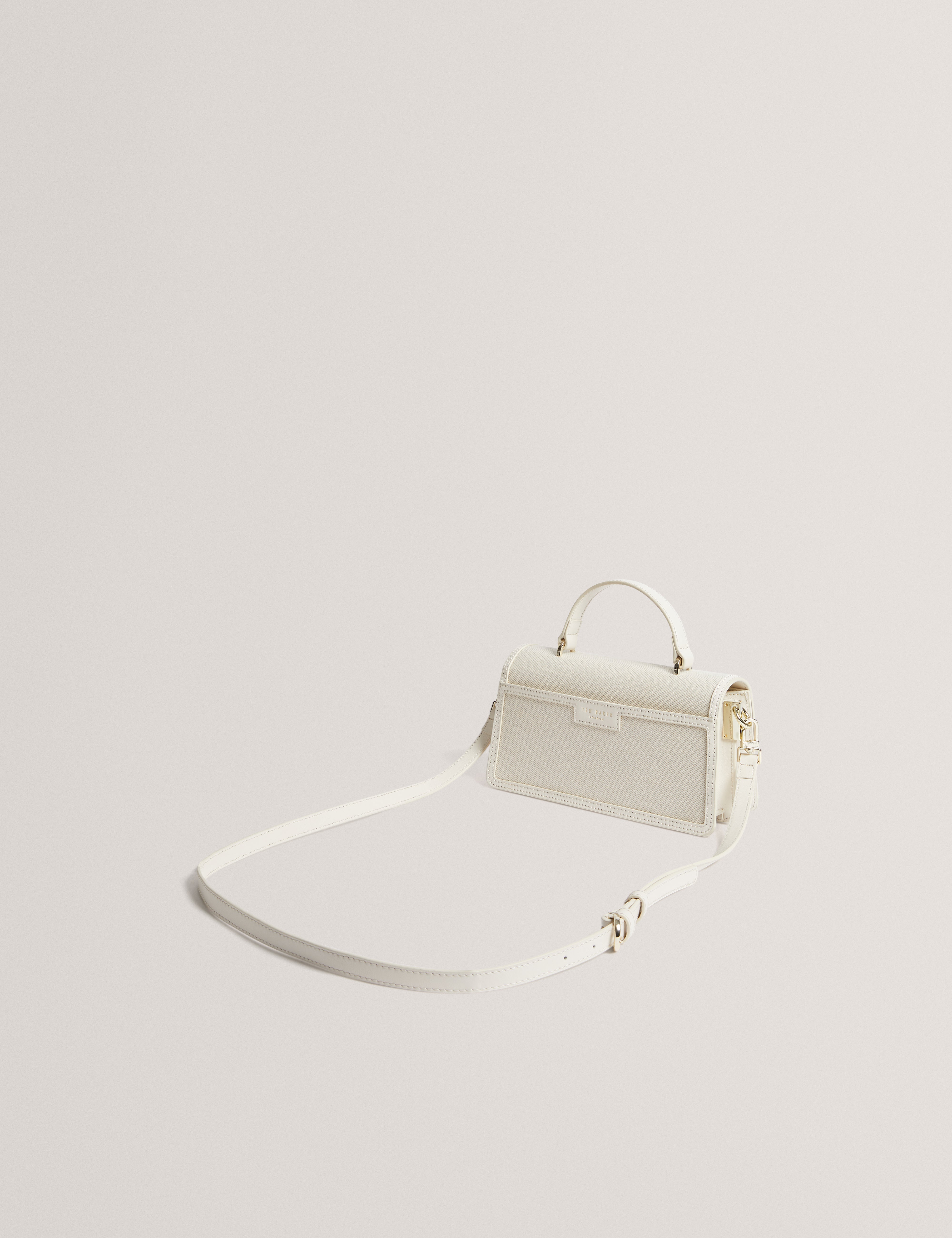 Audris Canvas Rose Hardware Elongate Ecru