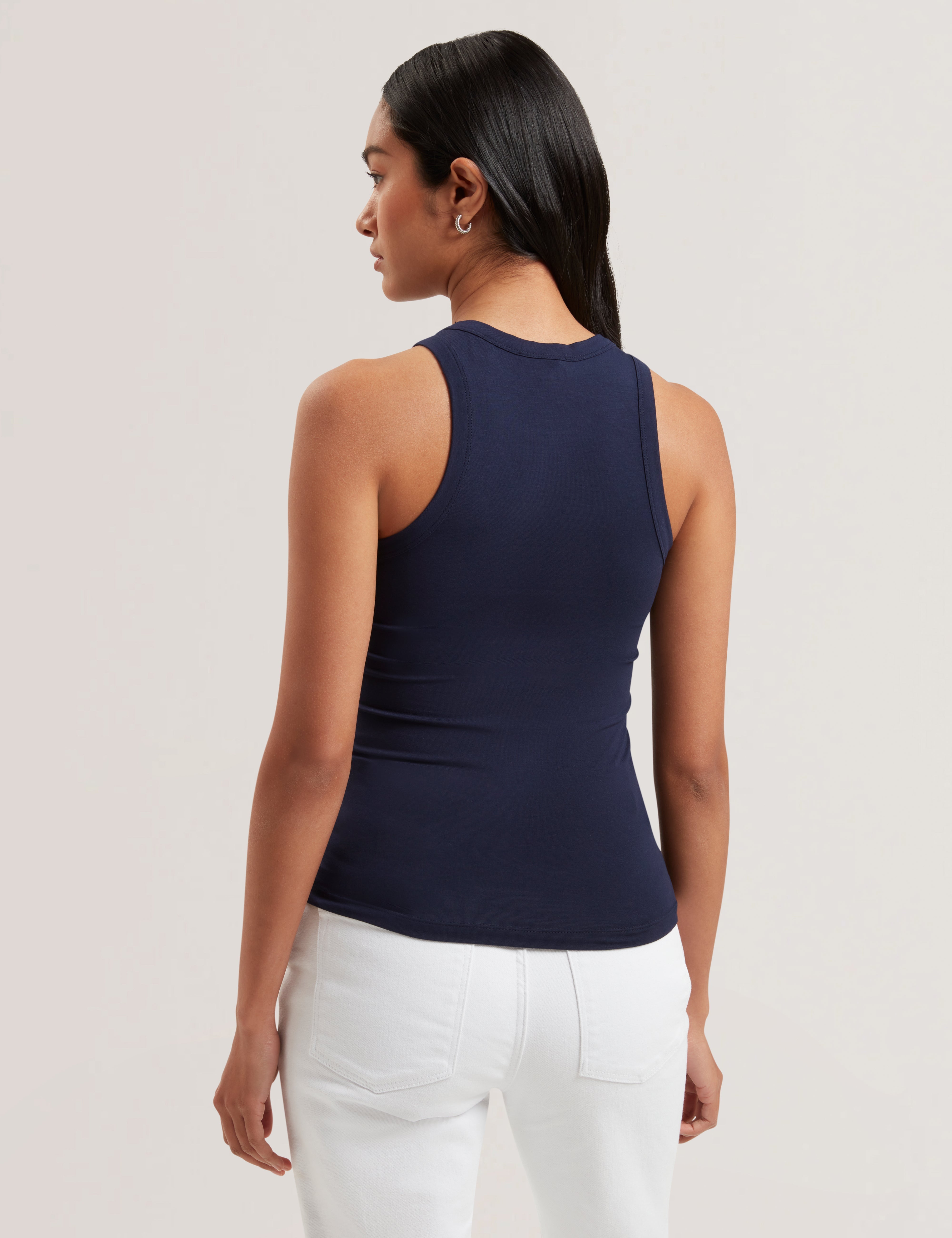 قميص كاسي جيرسي بدون أكمام مع علامة تجارية باللون الأزرق الداكن