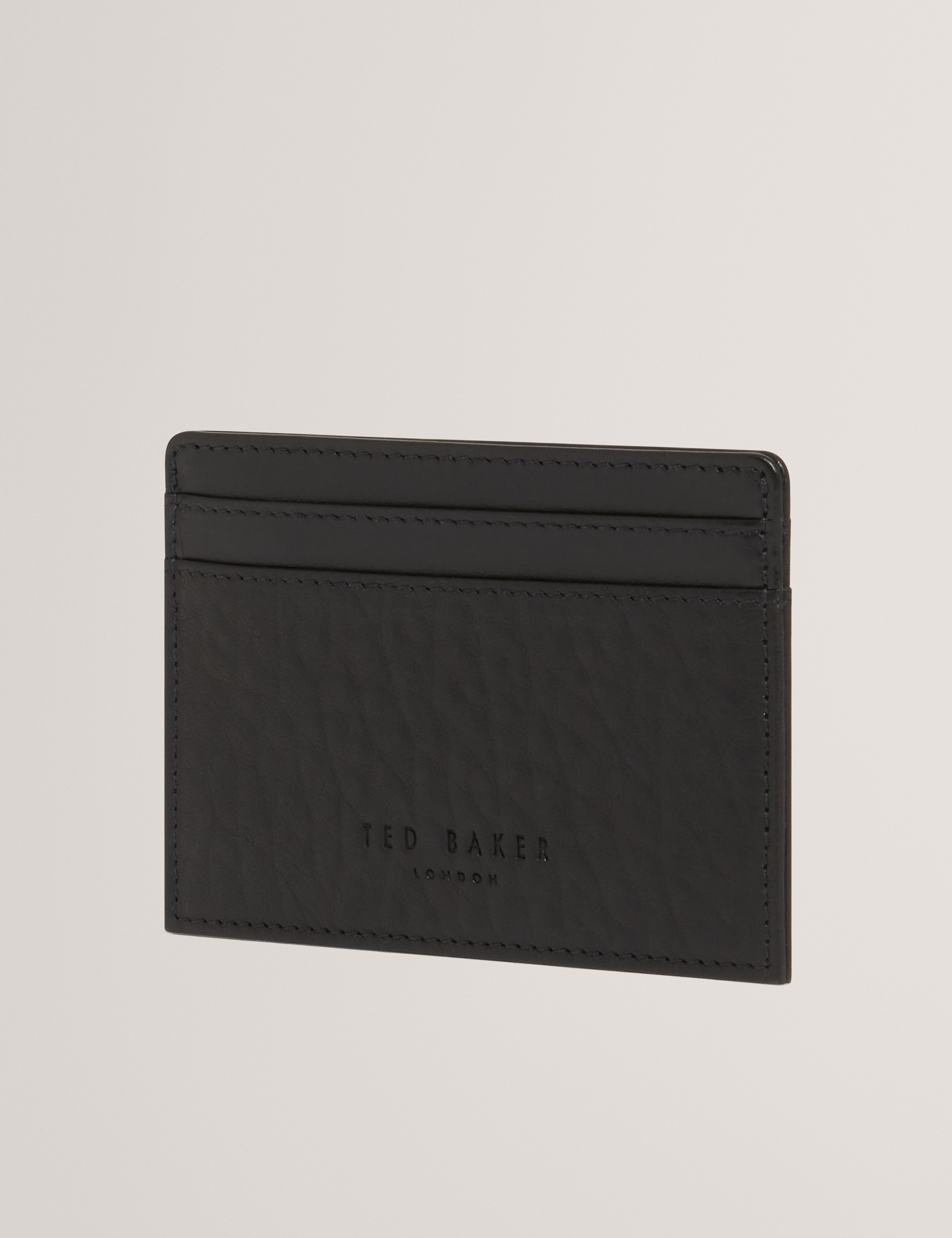 بيترز حامل بطاقات من الجلد باللون الأسود