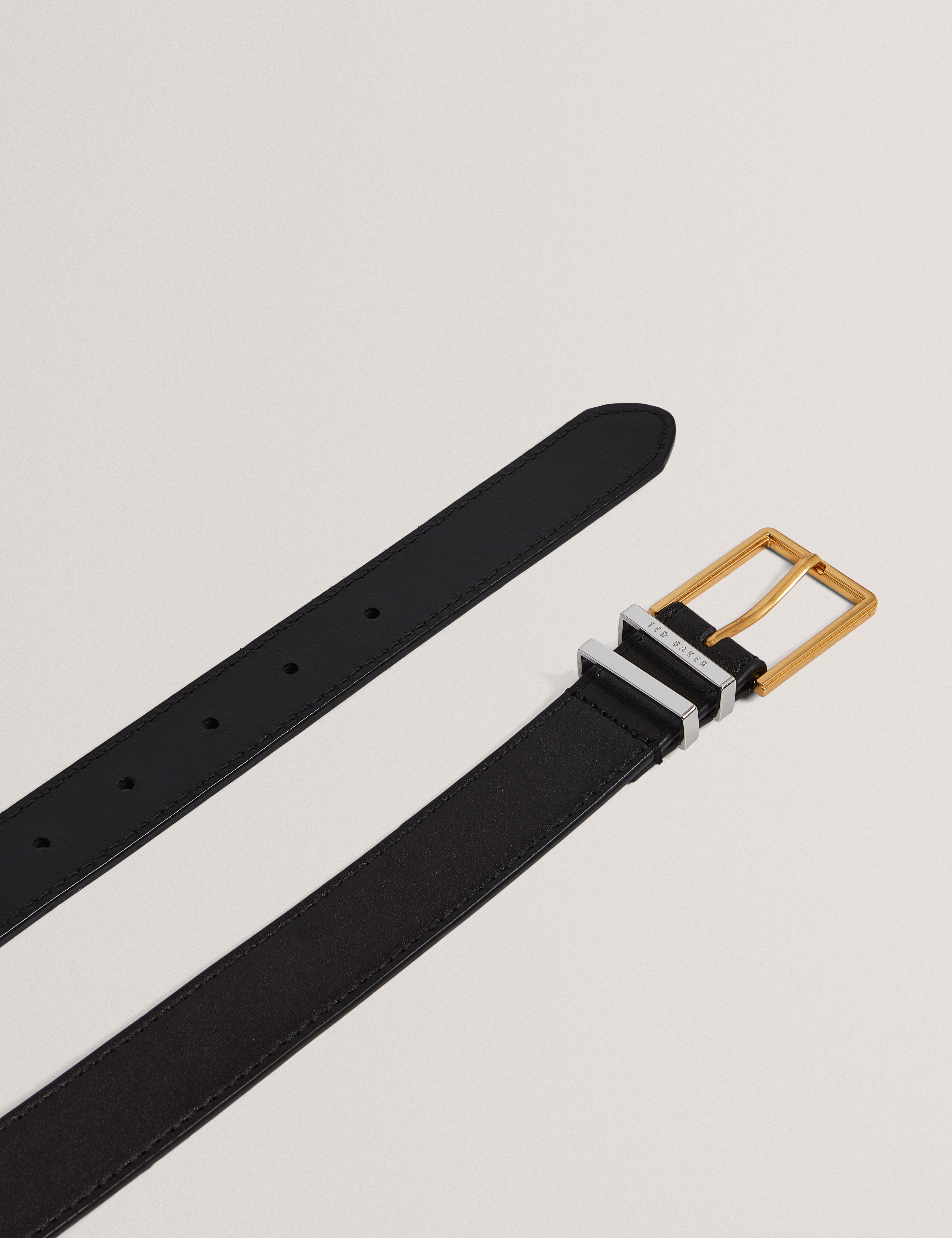 تالسي حزام من الجلد باللون الأسود