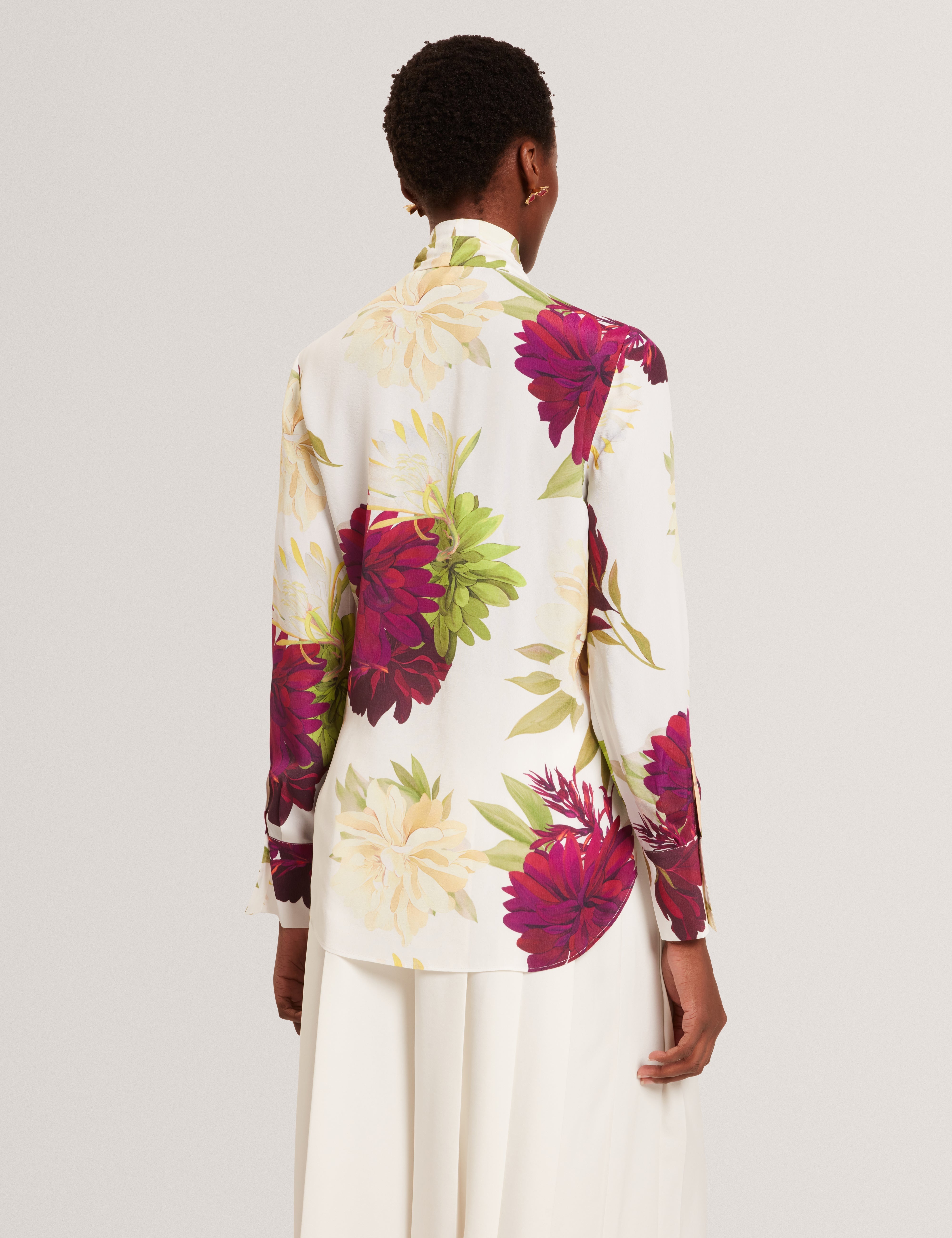 مارزينا بلوزة مطبّعة بأكمام طويلة لون عاجي