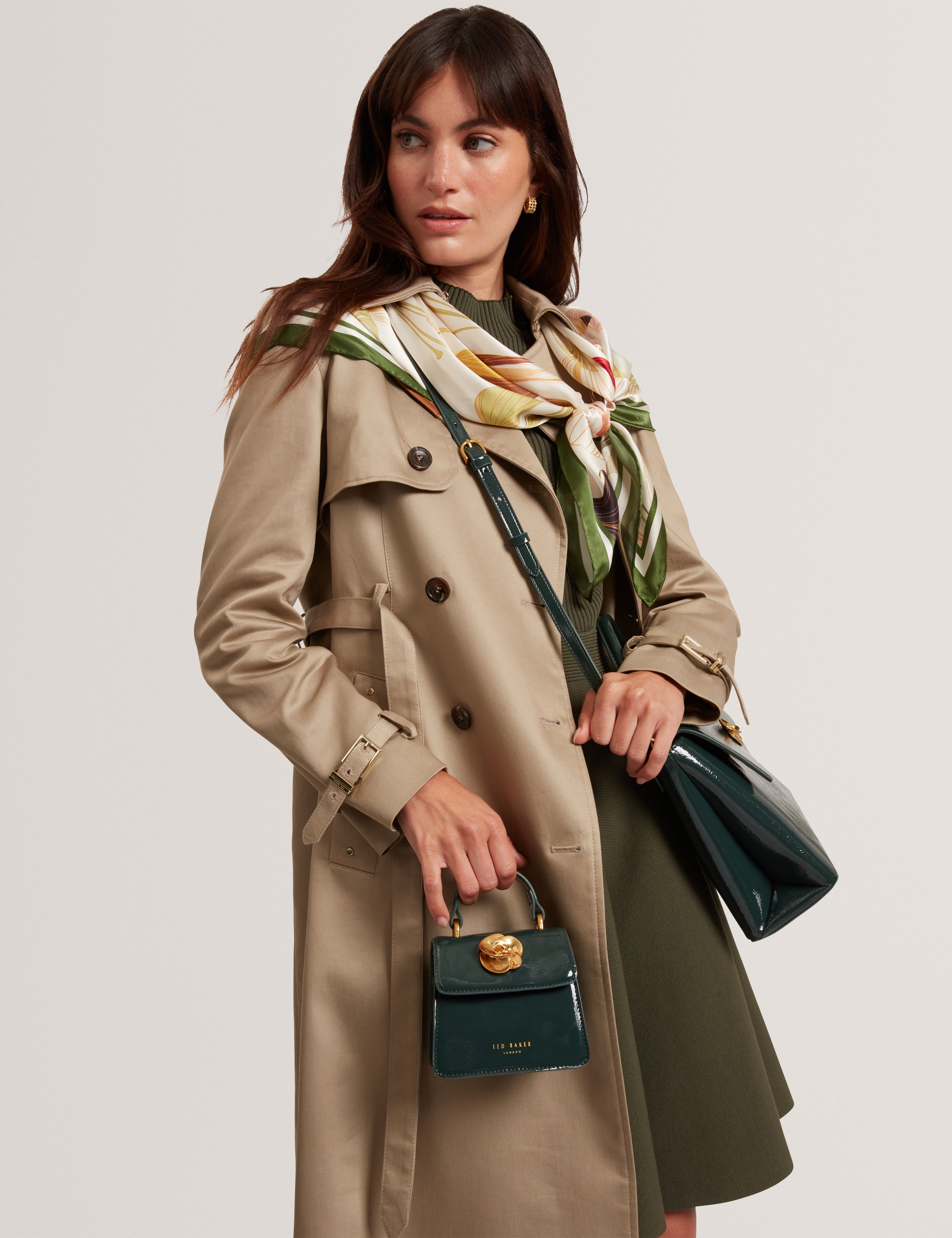 روزيلا روز حقيبة صغيرة بمقبض علوي لون أخضر داكن