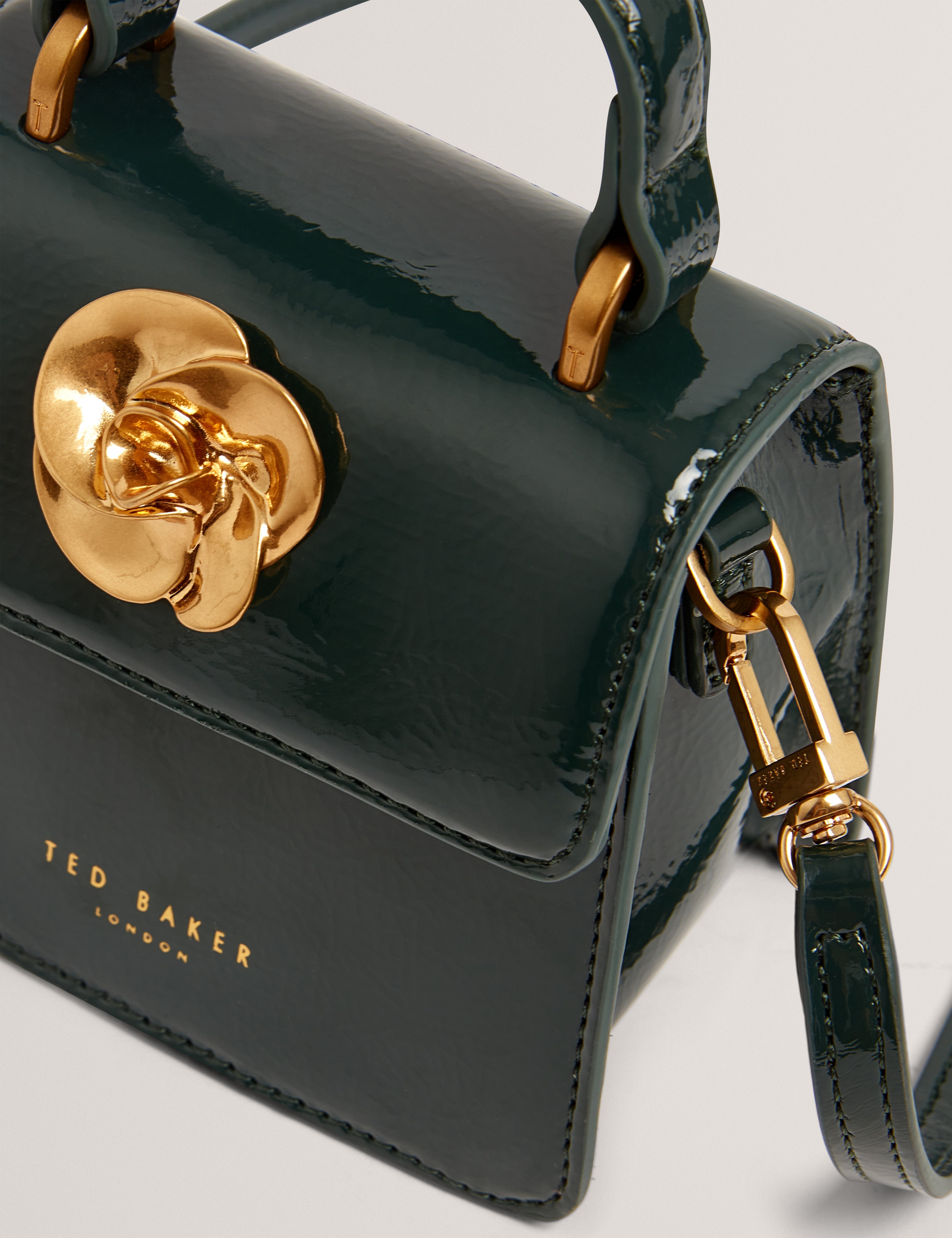 روزيلا روز حقيبة صغيرة بمقبض علوي لون أخضر داكن