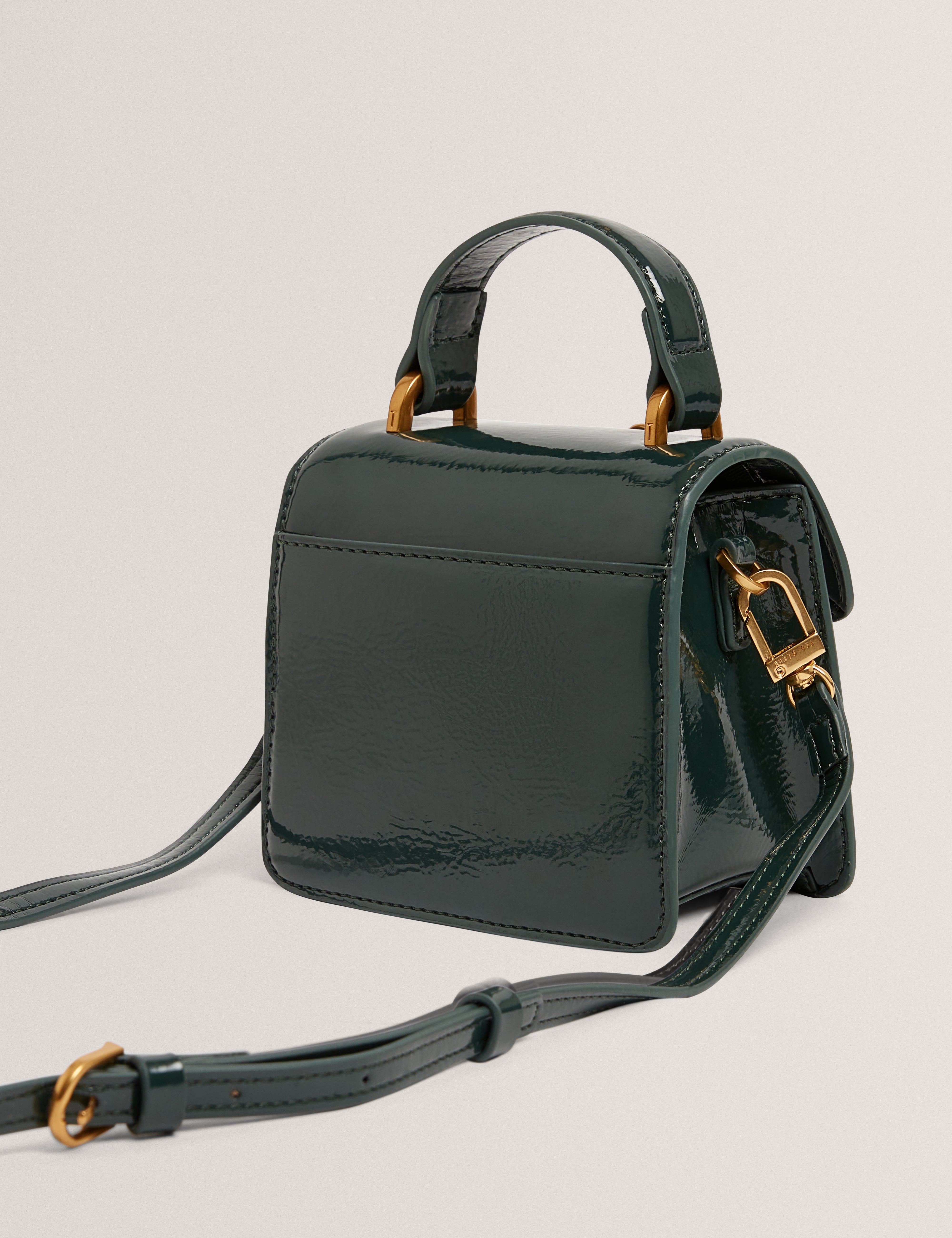 روزيلا روز حقيبة صغيرة بمقبض علوي لون أخضر داكن