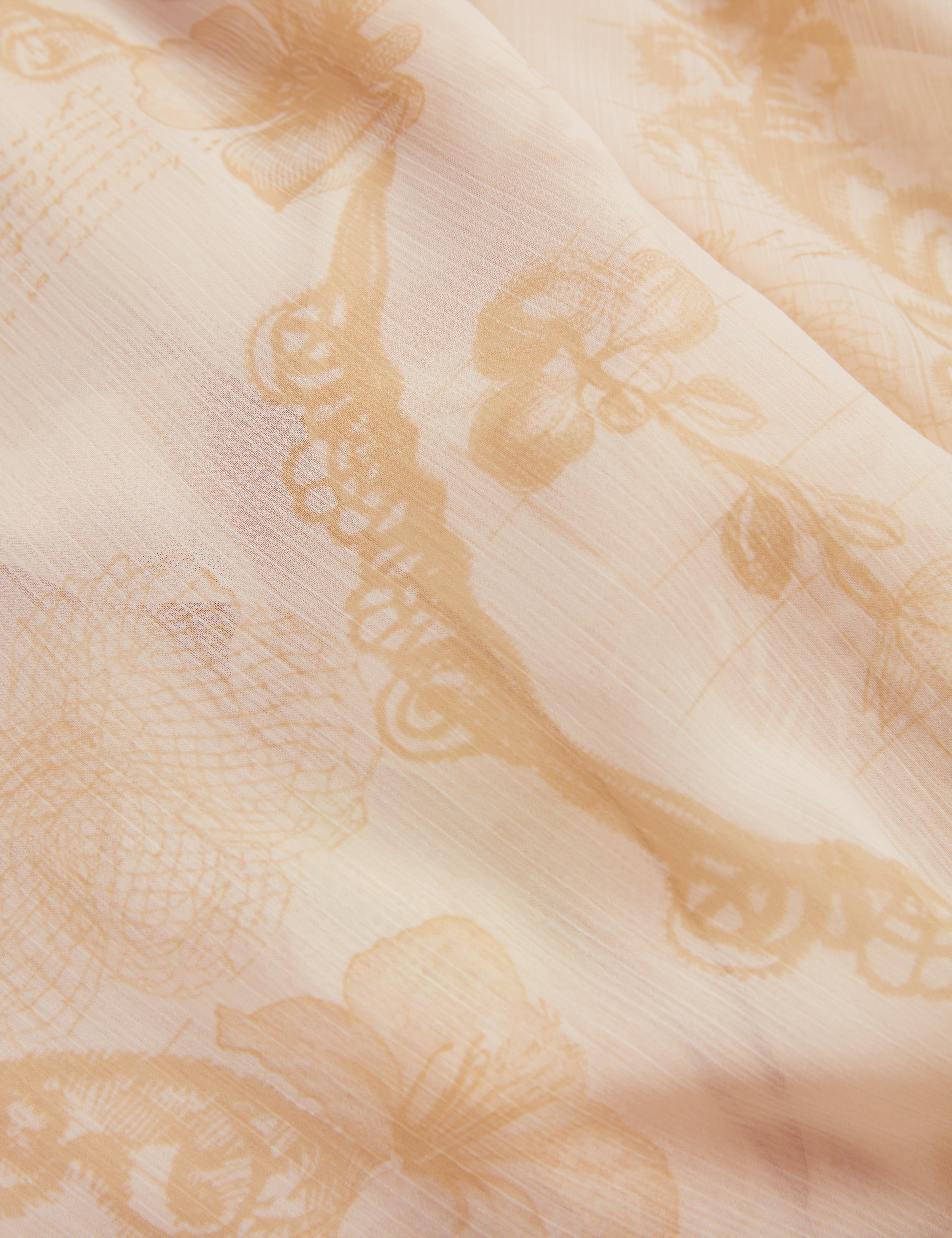 فستان ماكسي نييفا بتفاصيل كيب وشلال، لون أصفر فاتح