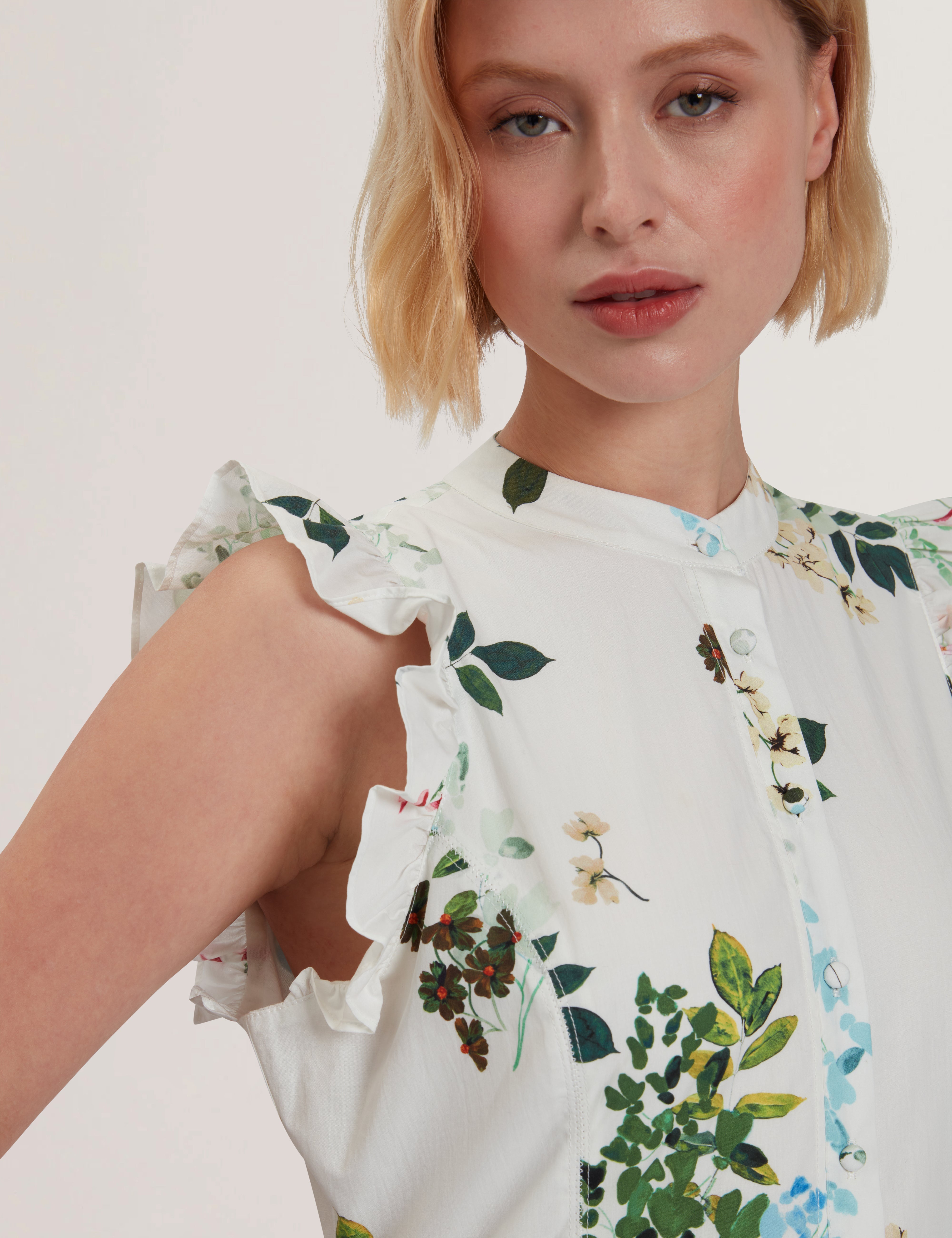 جيوليا فستان ميدي بدون أكمام لون أبيض