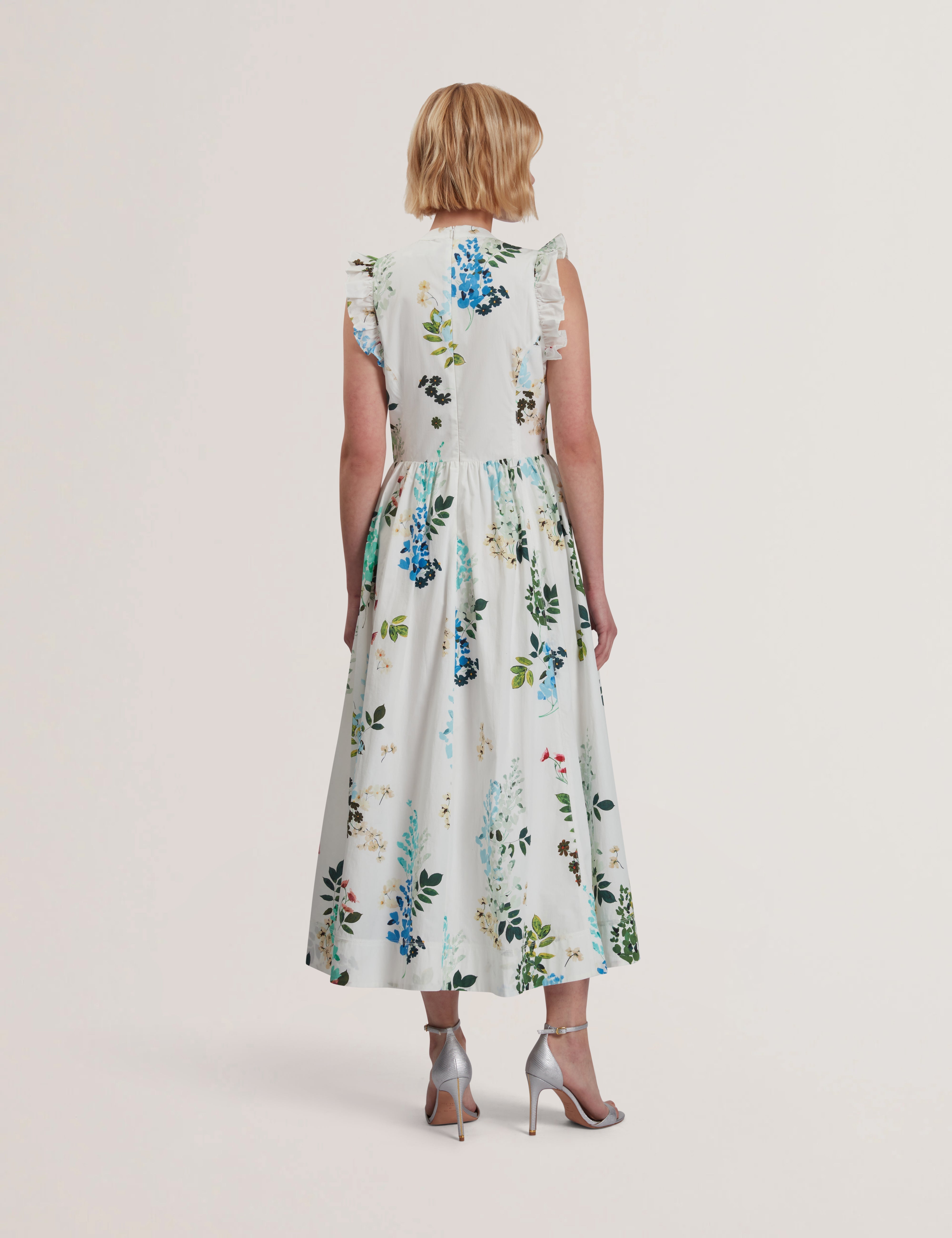 جيوليا فستان ميدي بدون أكمام لون أبيض