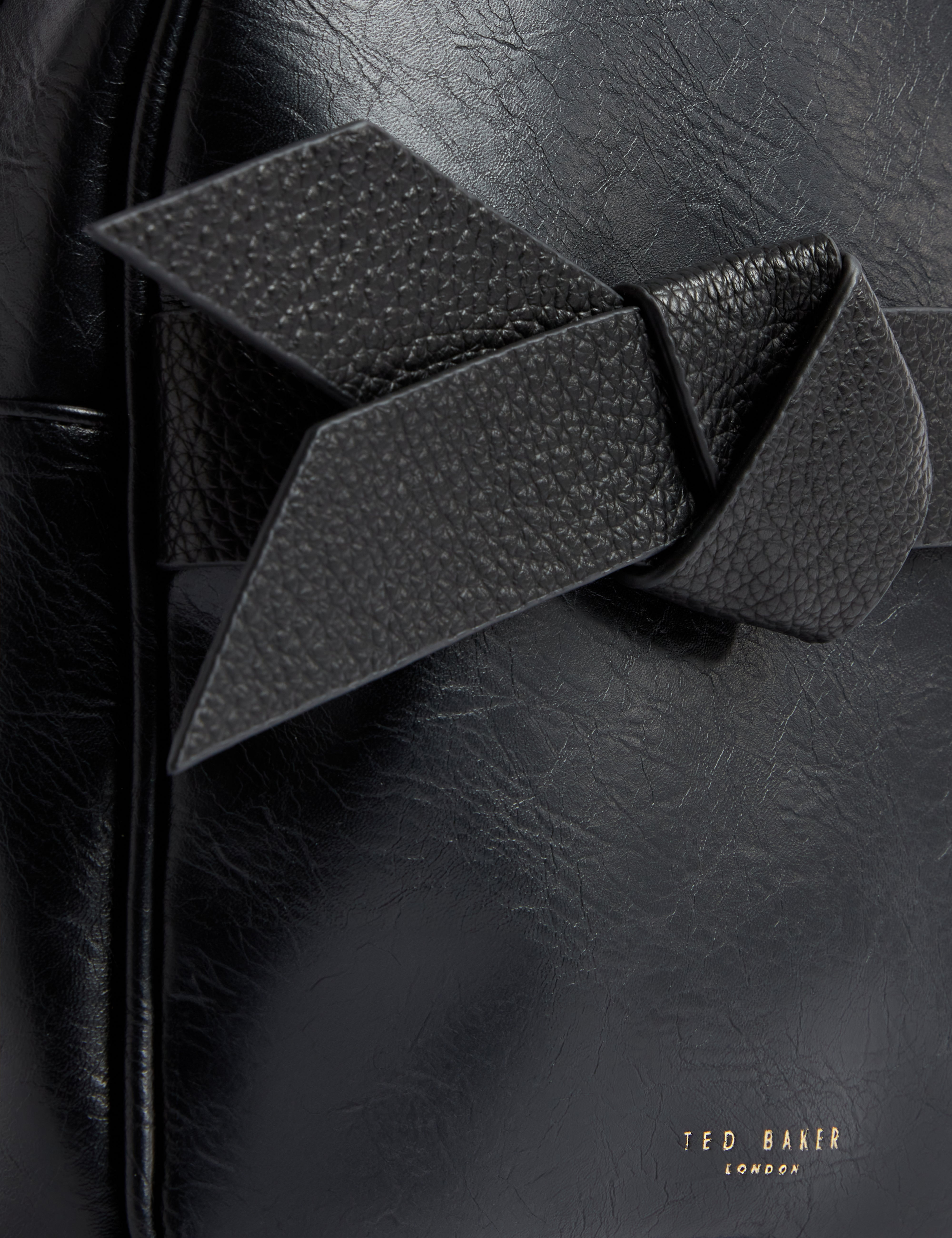 جيميليا حقيبة ظهر صغيرة مع فيونكا باللون الأسود