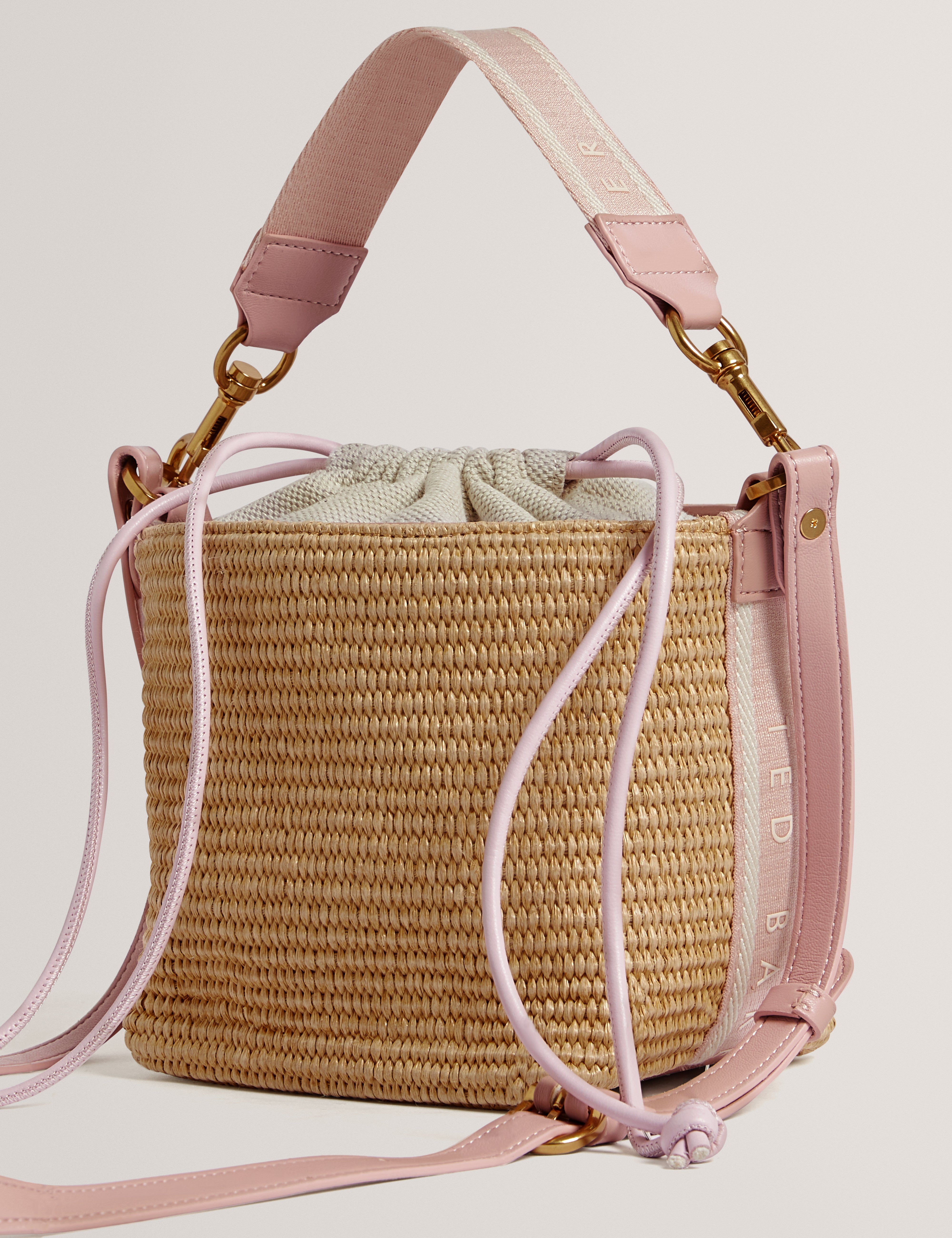 Raffyna Webbing Detail Raffia Small Bucket Bag Pink