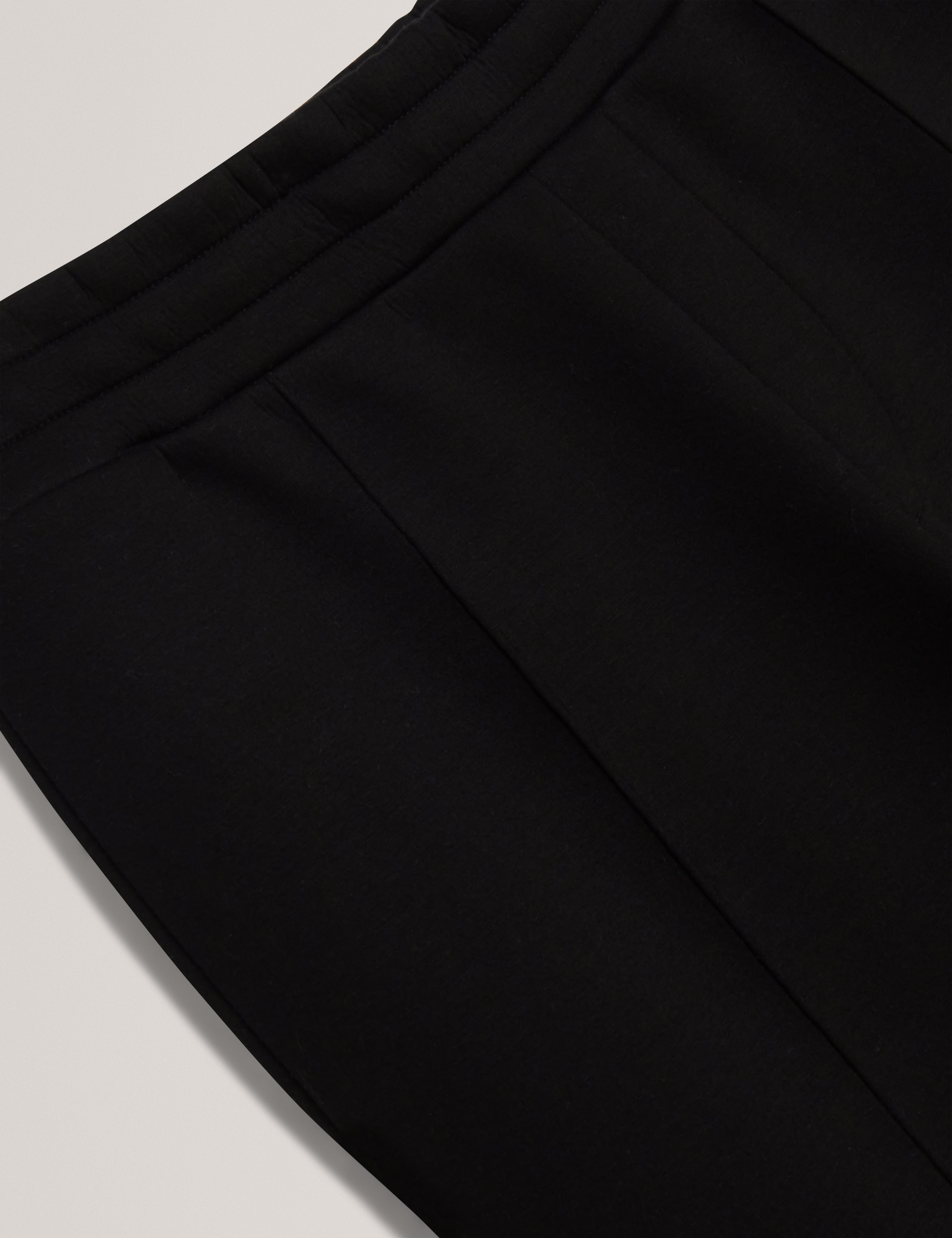 بنطال رياضي من النيوبرين بتصميم Slim Fit من Uaver باللون الأسود