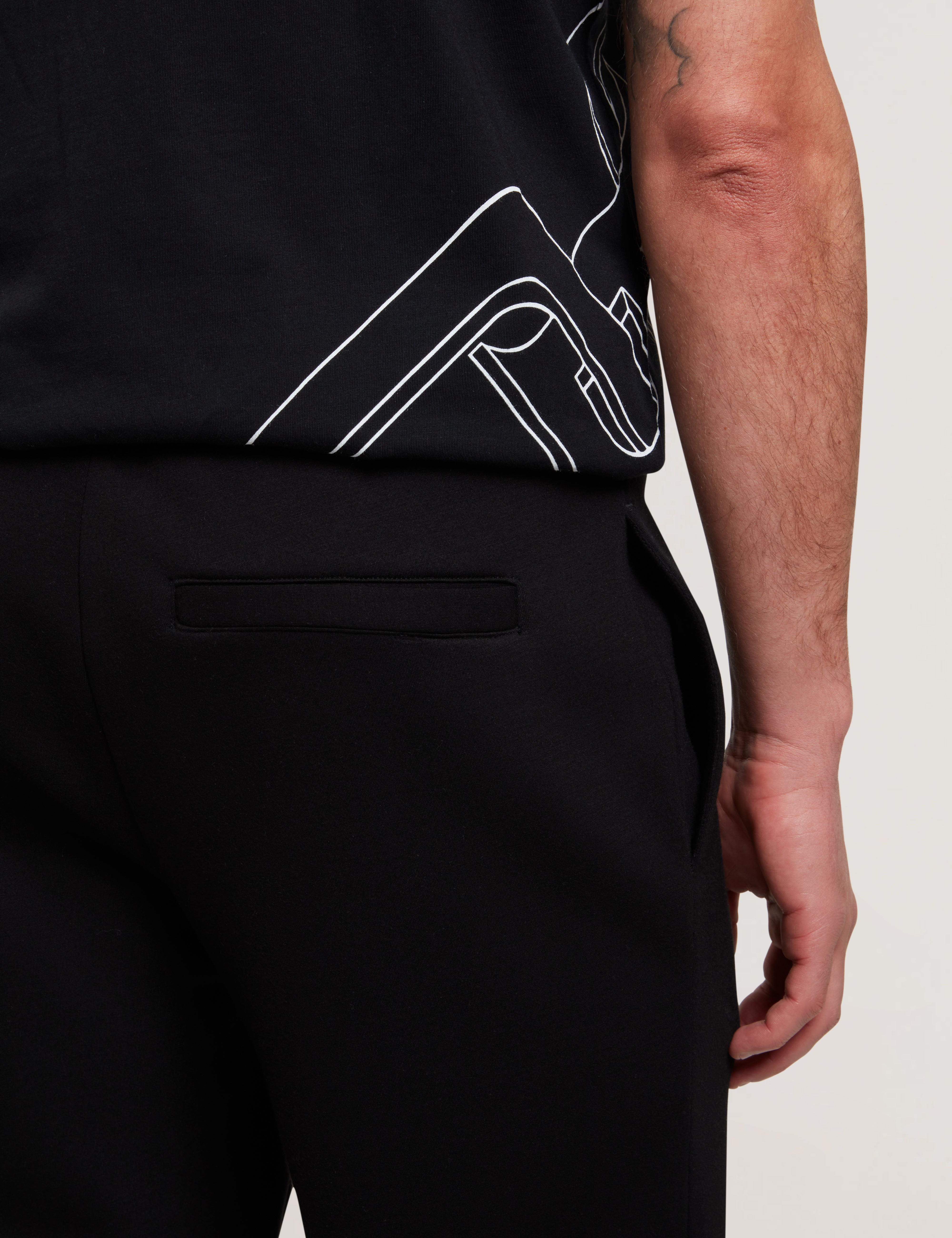 بنطال رياضي من النيوبرين بتصميم Slim Fit من Uaver باللون الأسود